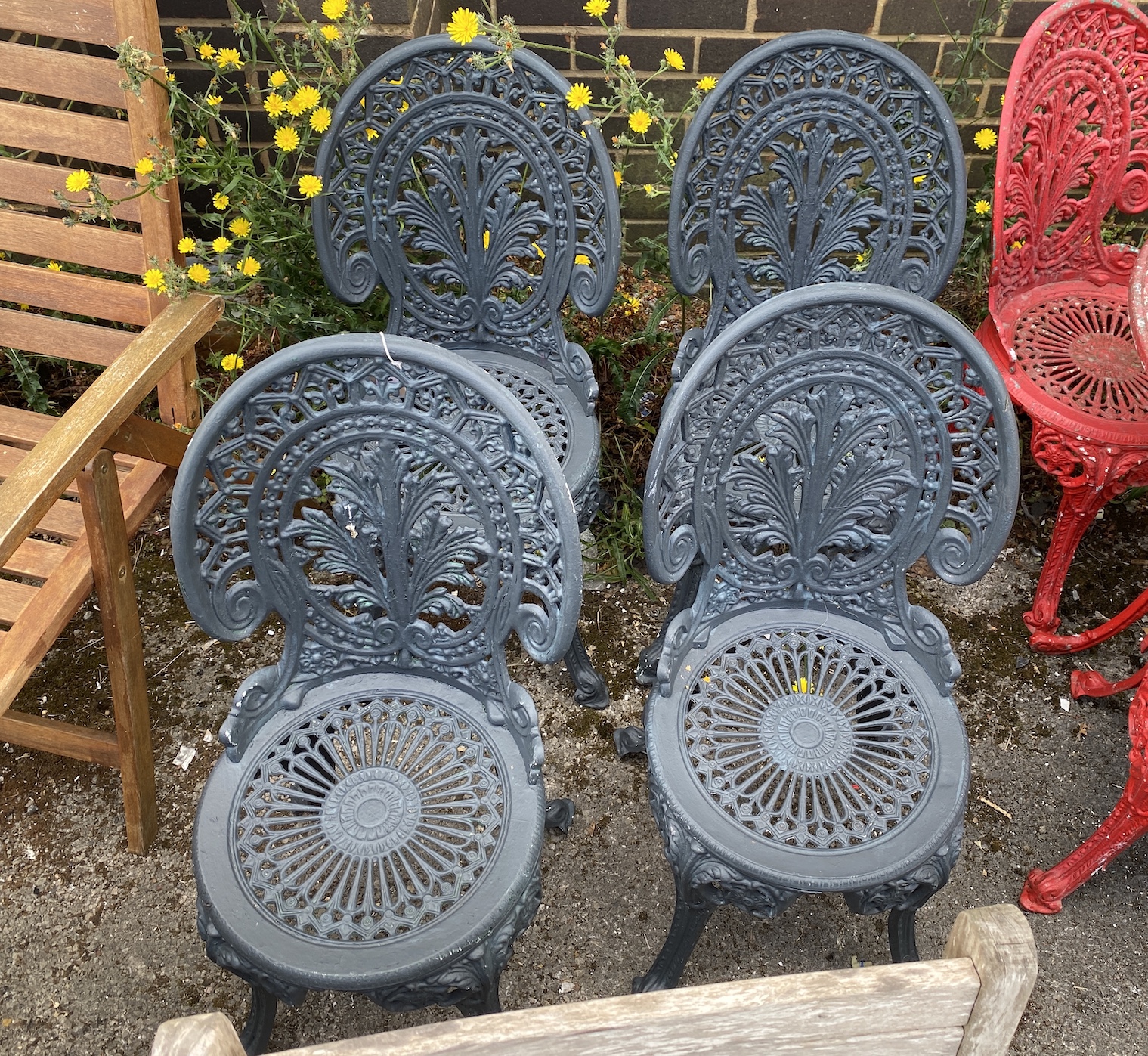 Four Victorian style painted aluminium garden chairs